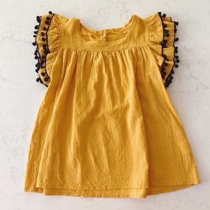 Girls Gold Shirt with Pompoms, size 7